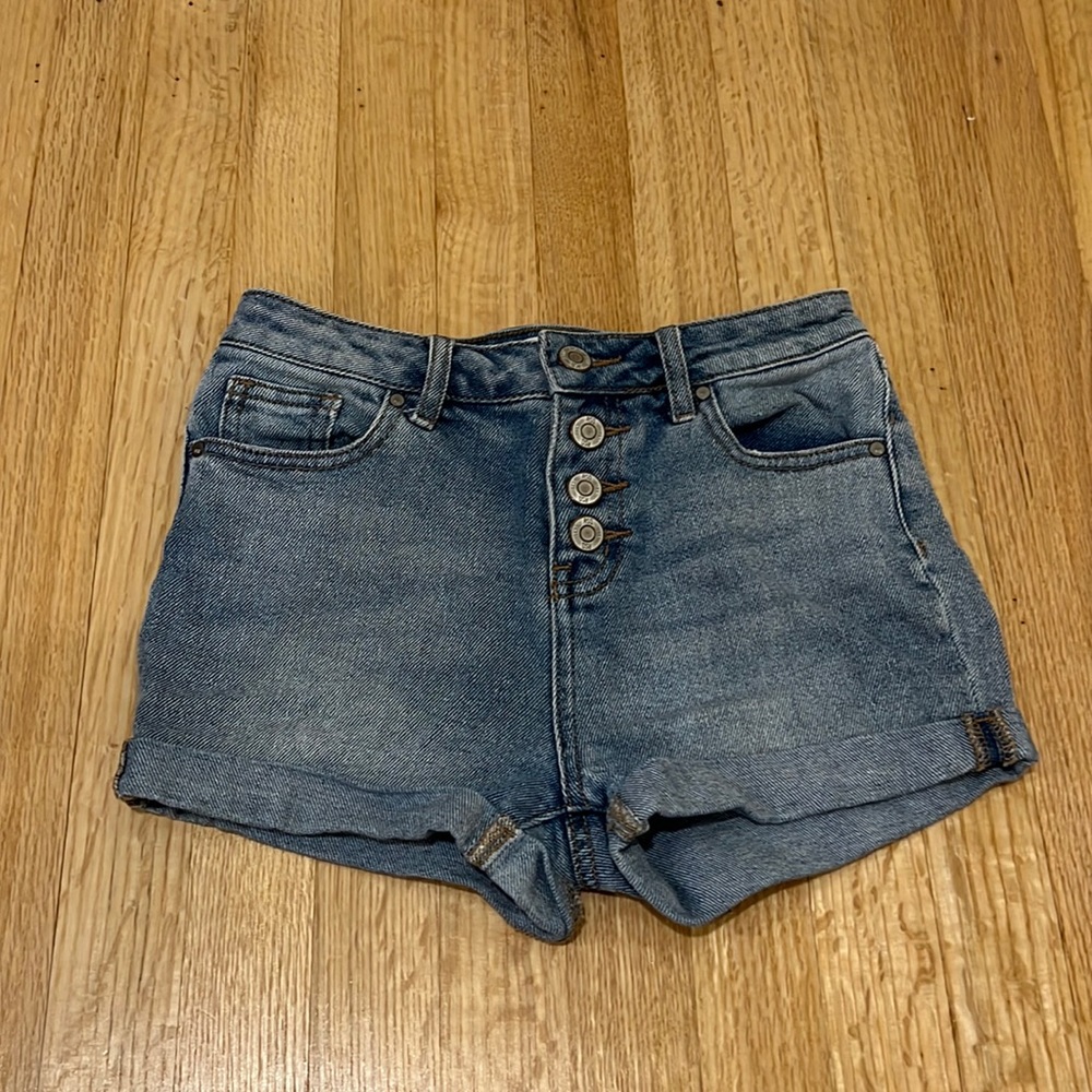Brand is RSQ bought at Tilly’s, size is 12, blue jean shorts.
